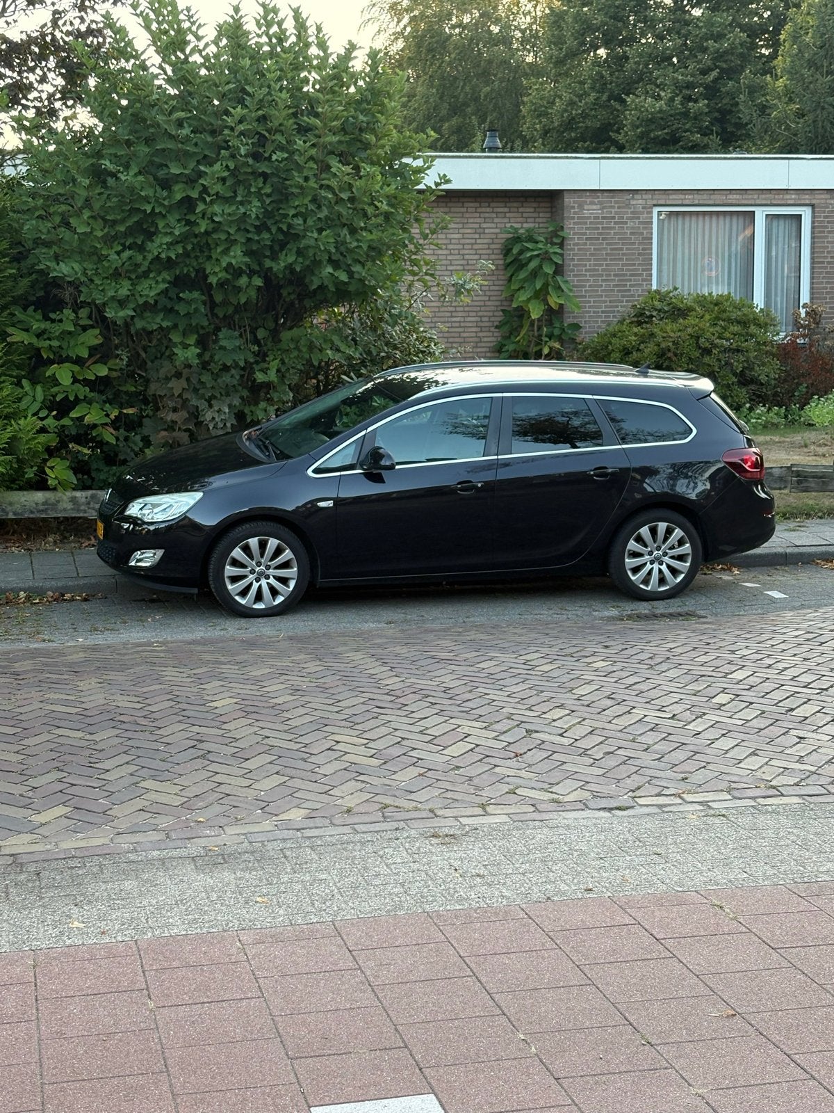 Opel Astra 1.4 74KW Sports Tourer 2011 Zwart, Auto's, Voorwielaandrijving, 4 cilinders, 100 pk, Zwart