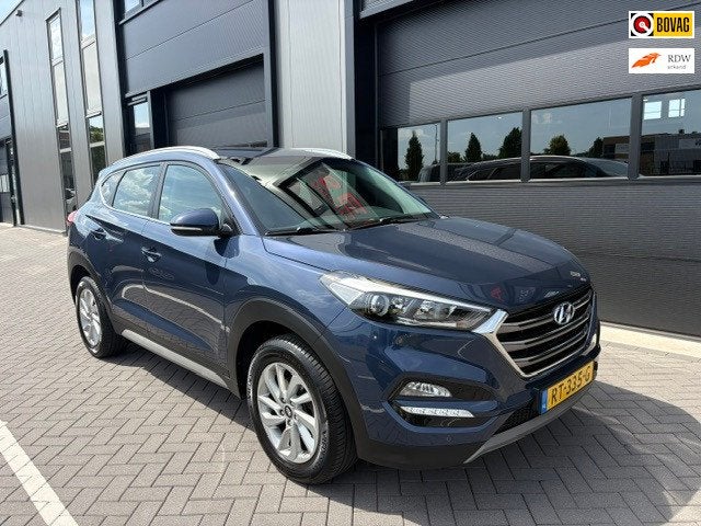 Hyundai Tucson 1.6 GDi Comfort, Auto's, Stof, Gebruikt, 4 cilinders, Blauw