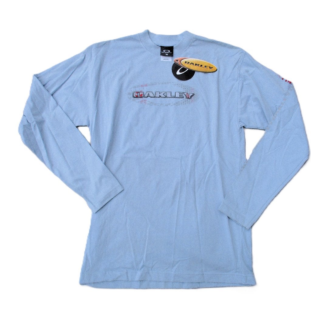 OAKLEY VINTAGE REPEAT STENCIL ICON LONGSLEEVE T-SHIRT  BLUE, Info@taurusvintage.nl, OAKLEY, Nieuw, WEG EN LAND