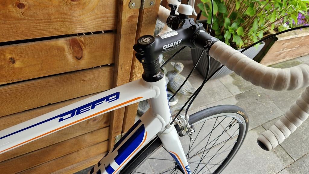 Giant Defy racefiets in Rabo kleuren, incl. accessoires, Fietsen en Brommers, Fietsen | Racefietsen, Ophalen, Gebruikt, Giant