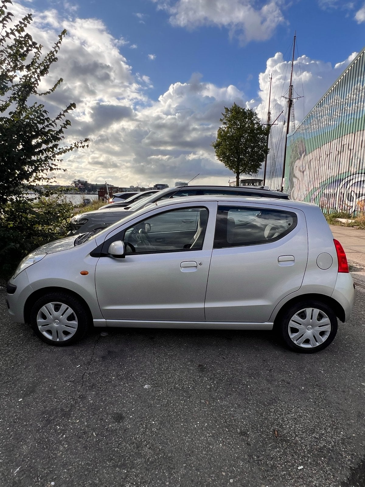 Nissan Pixo 1.0 50KW 5D 2010 Grijs, Auto's, Voorwielaandrijving, 200 kg, 4 stoelen, Origineel Nederlands