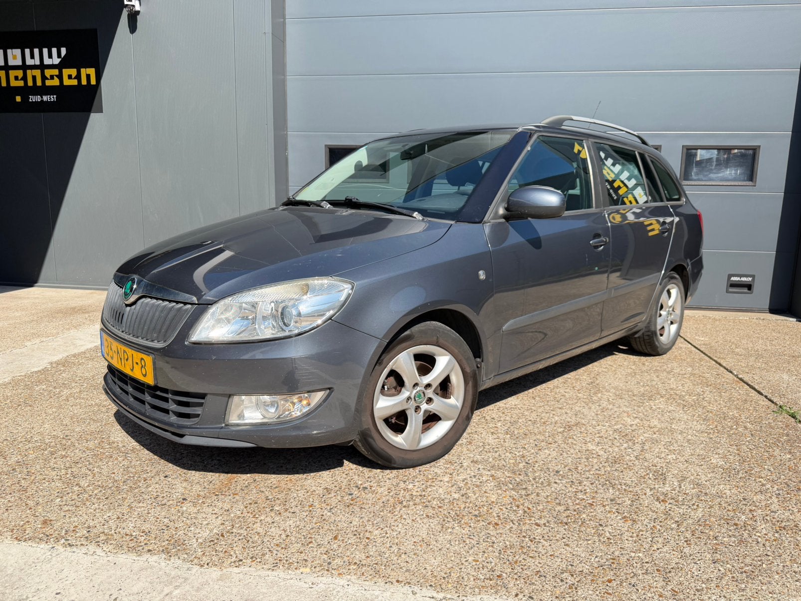 Skoda Fabia 1.2 TDI 55KW Combi 2010 Grijs Airco Apk Cruise, Auto's, Skoda, Voorwielaandrijving, Euro 5, Zwart, Origineel Nederlands