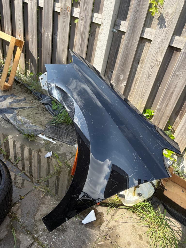 Spatbord zwart Volkswagen Polo 6R (2009-2015), Auto-onderdelen, Carrosserie en Plaatwerk, Gebruikt, Ophalen of Verzenden, Spatbord