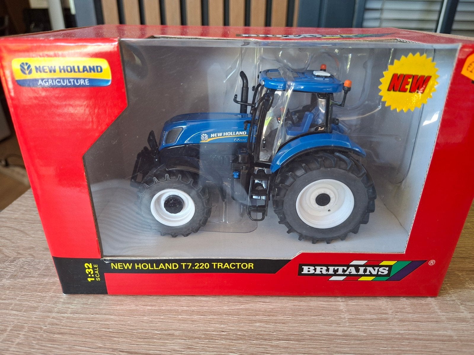 New Holland T7.220 Tractor van Britains - Schaal 1:32, Hobby en Vrije tijd, Modelauto's | 1:32, Nieuw, Overige typen, Overige merken