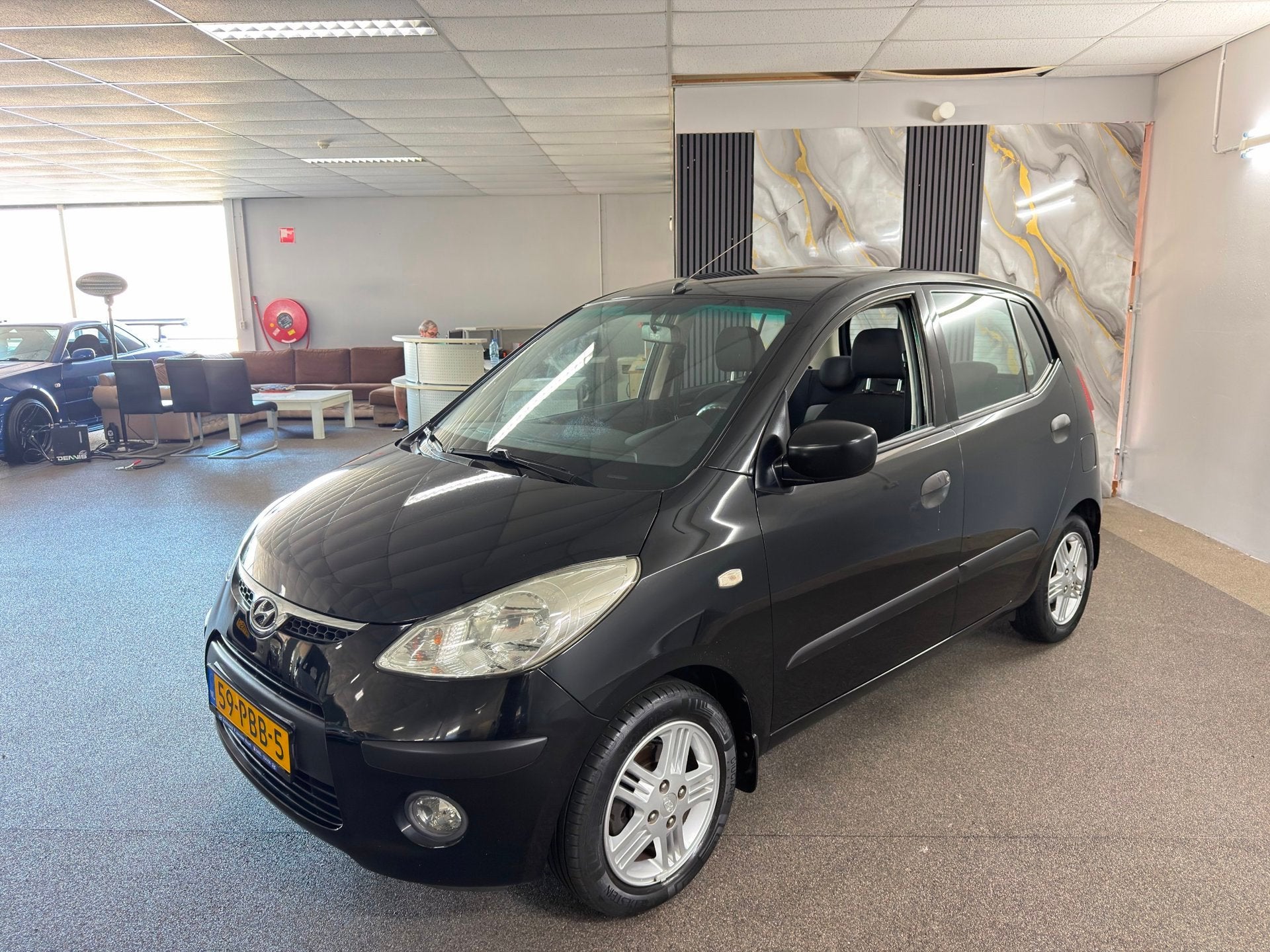 Hyundai I10 1.1 Active Orange Babies, 1e Eigenaar,Airco,E-Ra, Auto's, Dealer onderhouden, Stof, Gebruikt, 4 cilinders