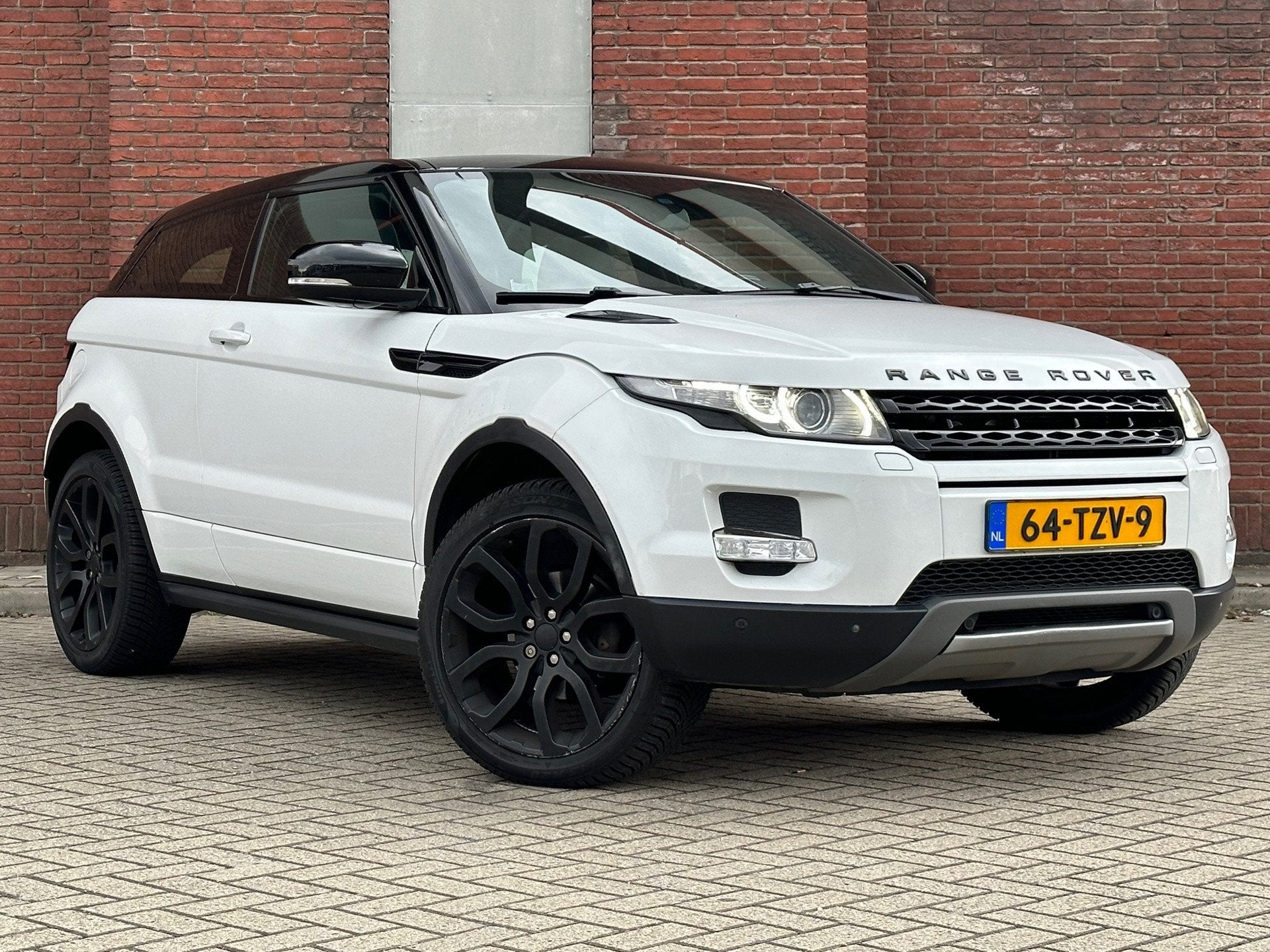 Land Rover Range Rover Evoque Coupé 2.0 Si 4WD Prestige|AUT, Auto's, Automaat, Euro 5, 4 cilinders, 4 stoelen
