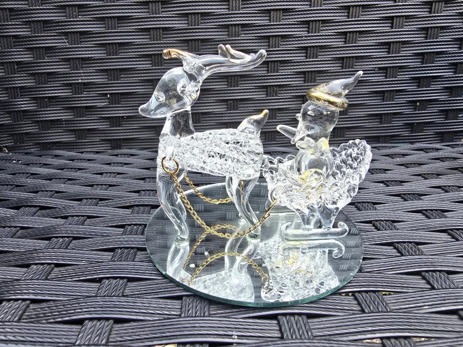 Glazen kerstsfeer beeldjes, Ophalen