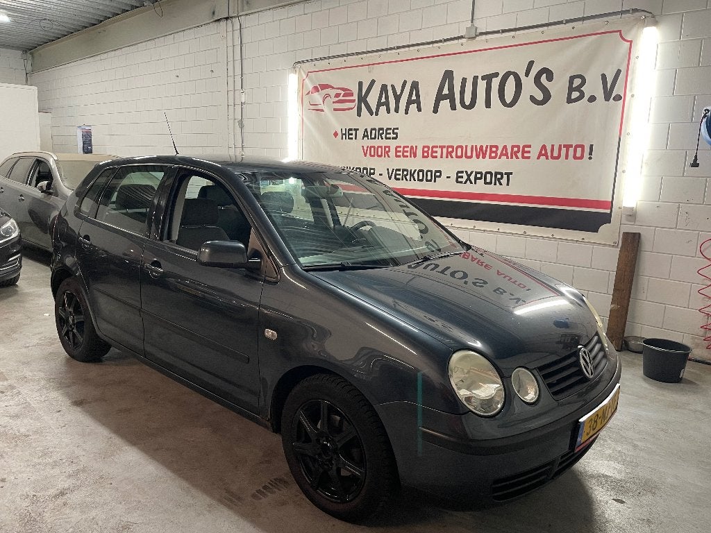 Volkswagen Polo 1.4 AIRCO 5-DEURS, Auto's, Voorwielaandrijving, 15 km/l, Blauw, Origineel Nederlands