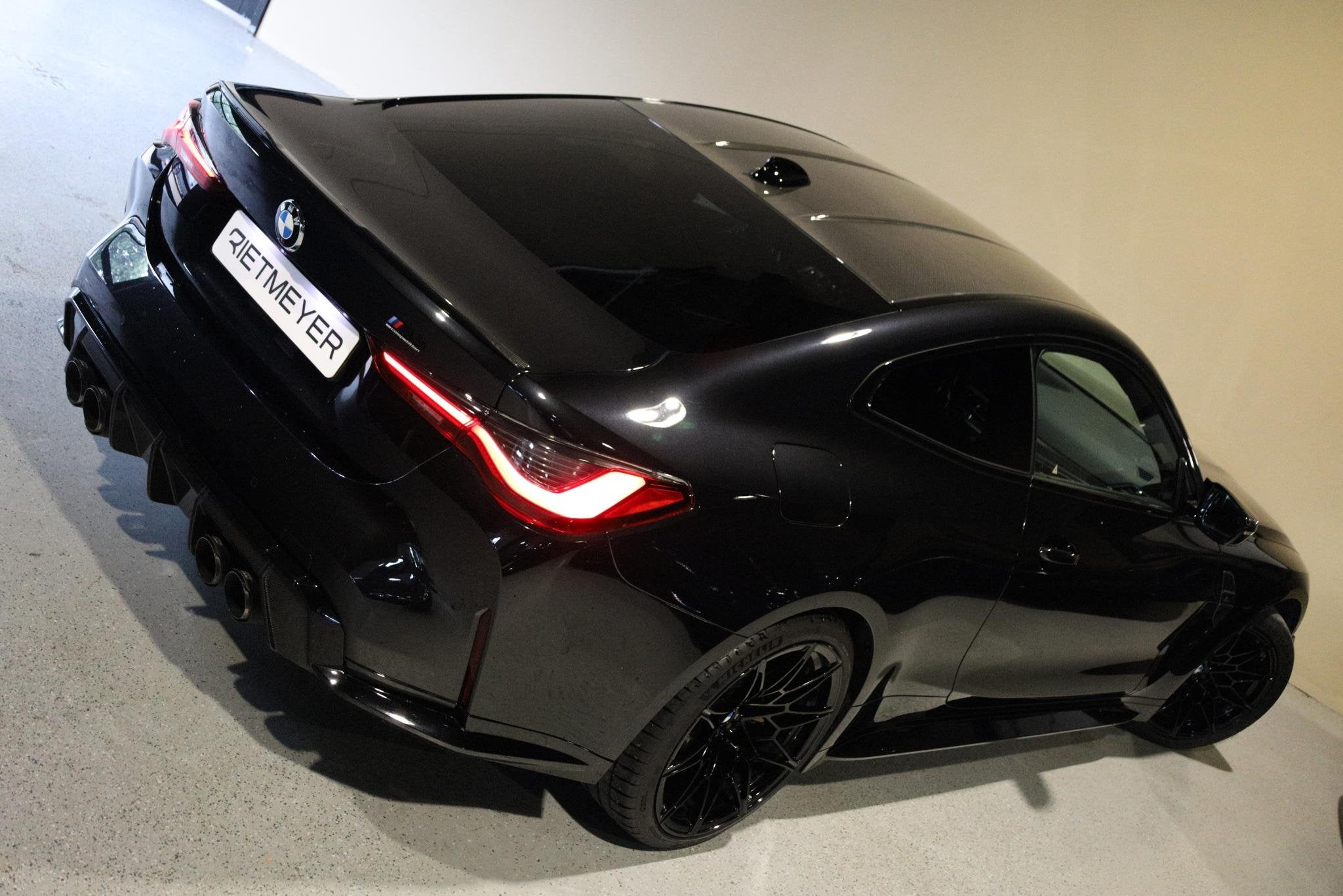 BMW 4-serie Coupé M4 Competition |Track Pack |Carbon Kuipst, 12 maanden, Gebruikt, 4 stoelen, Zwart