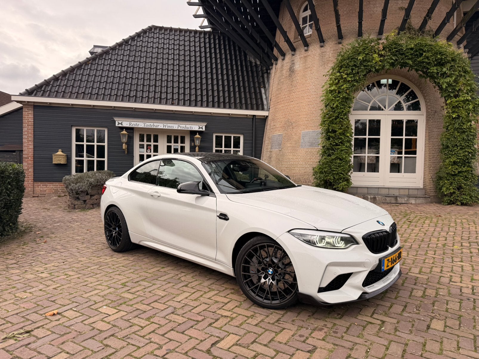 BMW M2 Competition | Akrapovič | Track Pack | Dealer onderh., Auto's, Automaat, Dealer onderhouden, Achterwielaandrijving, Zwart