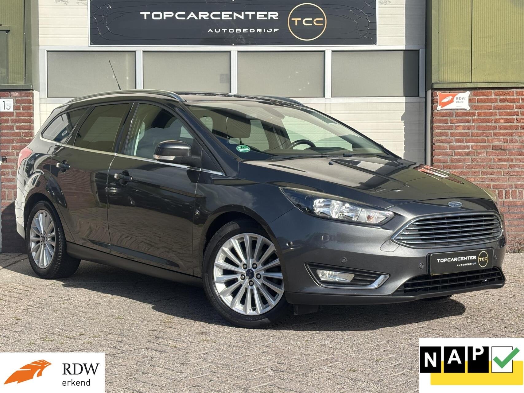 Ford Focus Wagon1.0 Titanium/AIRCO/NAVI/PARKS/CRUISE/APK/NAP, 125 pk, Euro 6, Origineel Nederlands, Handgeschakeld