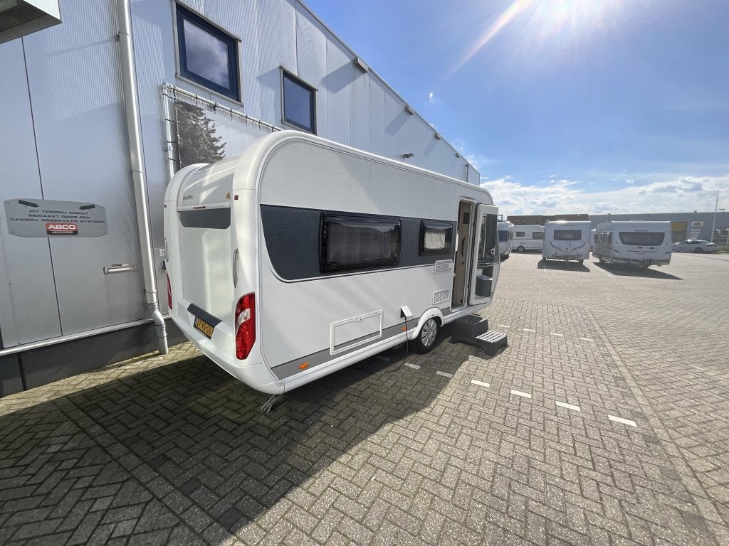 Hobby De Luxe Edition 460 LU ENKELE BEDDEN-MOVER, Caravans en Kamperen, Rondzit, Hobby, Bedrijf, Schokbreker
