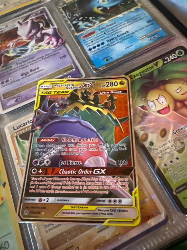 Naganadel & Guzzlord GX Tag Team Pokémon Kaart, Ophalen of Verzenden, Zo goed als nieuw, Losse kaart