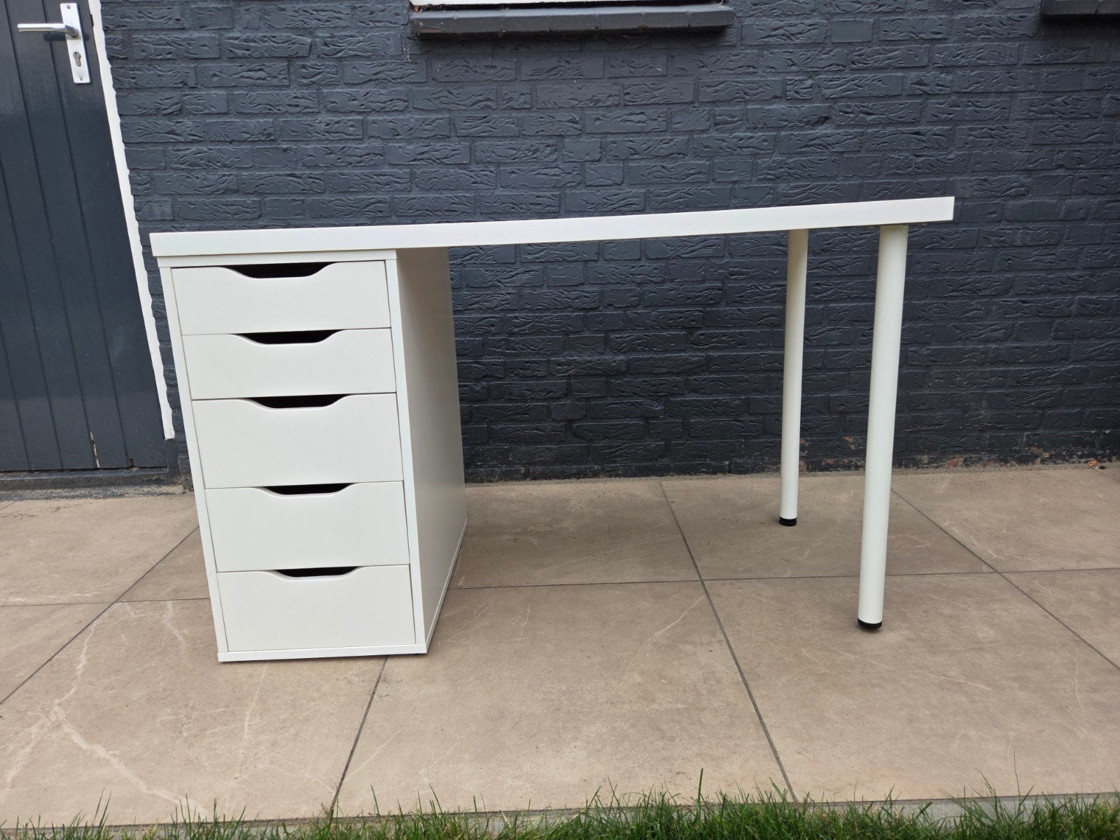 IKEA bureau met lades en poten, Ophalen