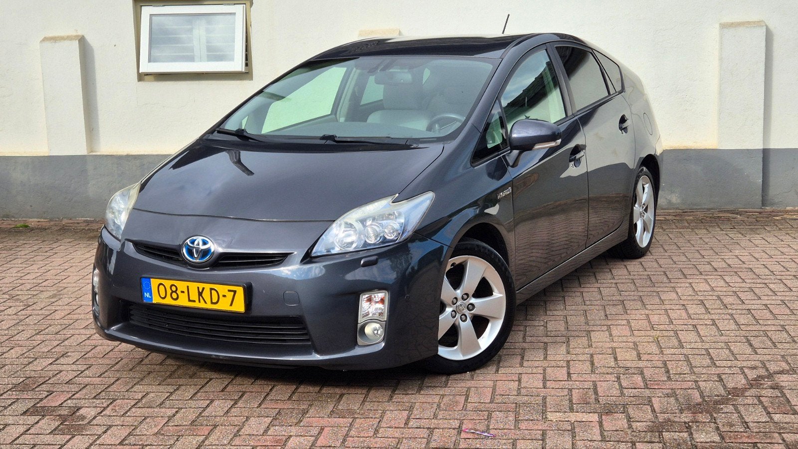Toyota Prius 1.8 Full Hybrid 136PK Aut 2010 Grijs/Inruil mog, Auto's, Toyota, 1345 kg, Stof, Beige, 4 cilinders