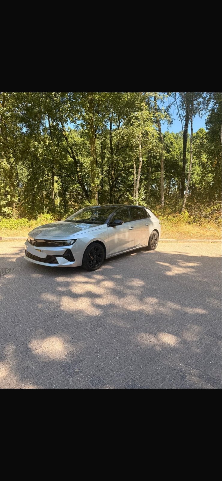 Opel Astra 1.2 Turbo 130pk Start/stop 2023 Grijs, Auto's, 680 kg, 1199 cc, Origineel Nederlands, 1200 kg