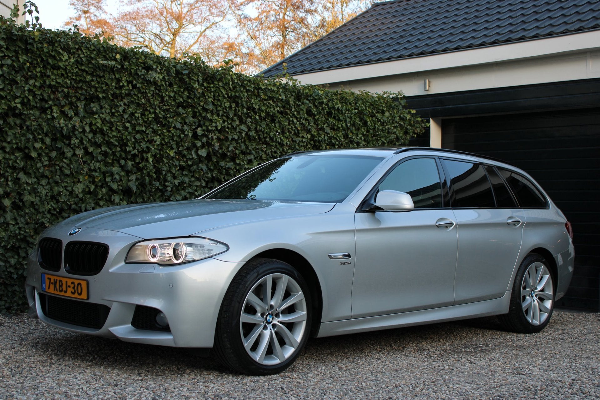 BMW 5-serie Touring 528xi High Executive | xDrive | M-pakket, Auto's, Automaat, Gebruikt, Zwart, 4 cilinders