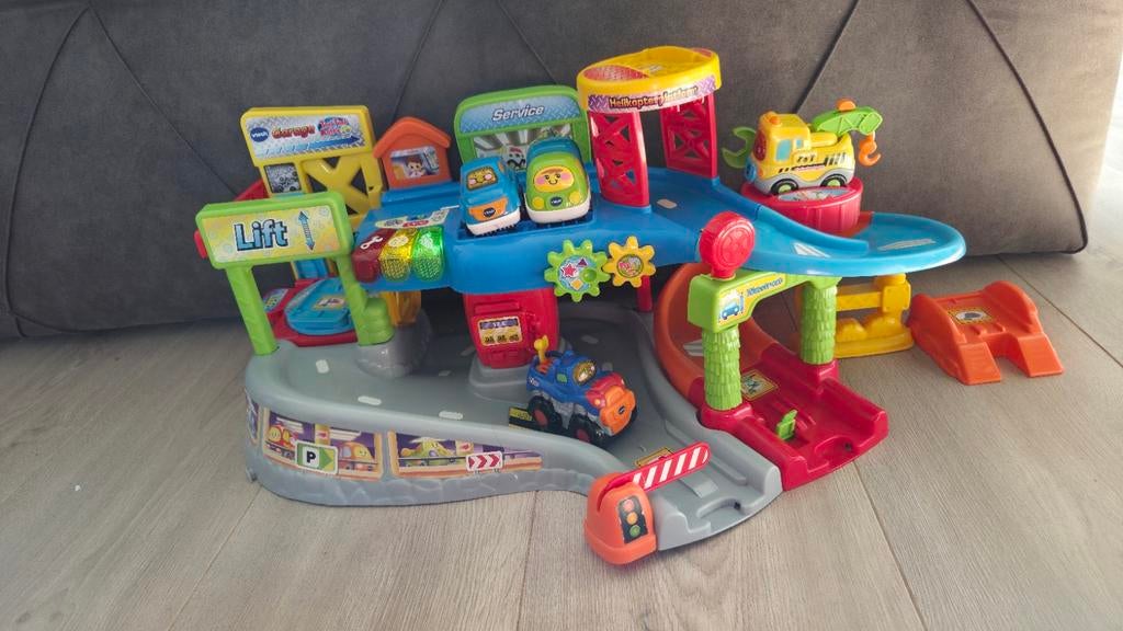 VTech Toet Toet Auto's Garage met 4 auto's, Kinderen en Baby's, Speelgoed | Overig, Ophalen, Zo goed als nieuw, Jongen of Meisje