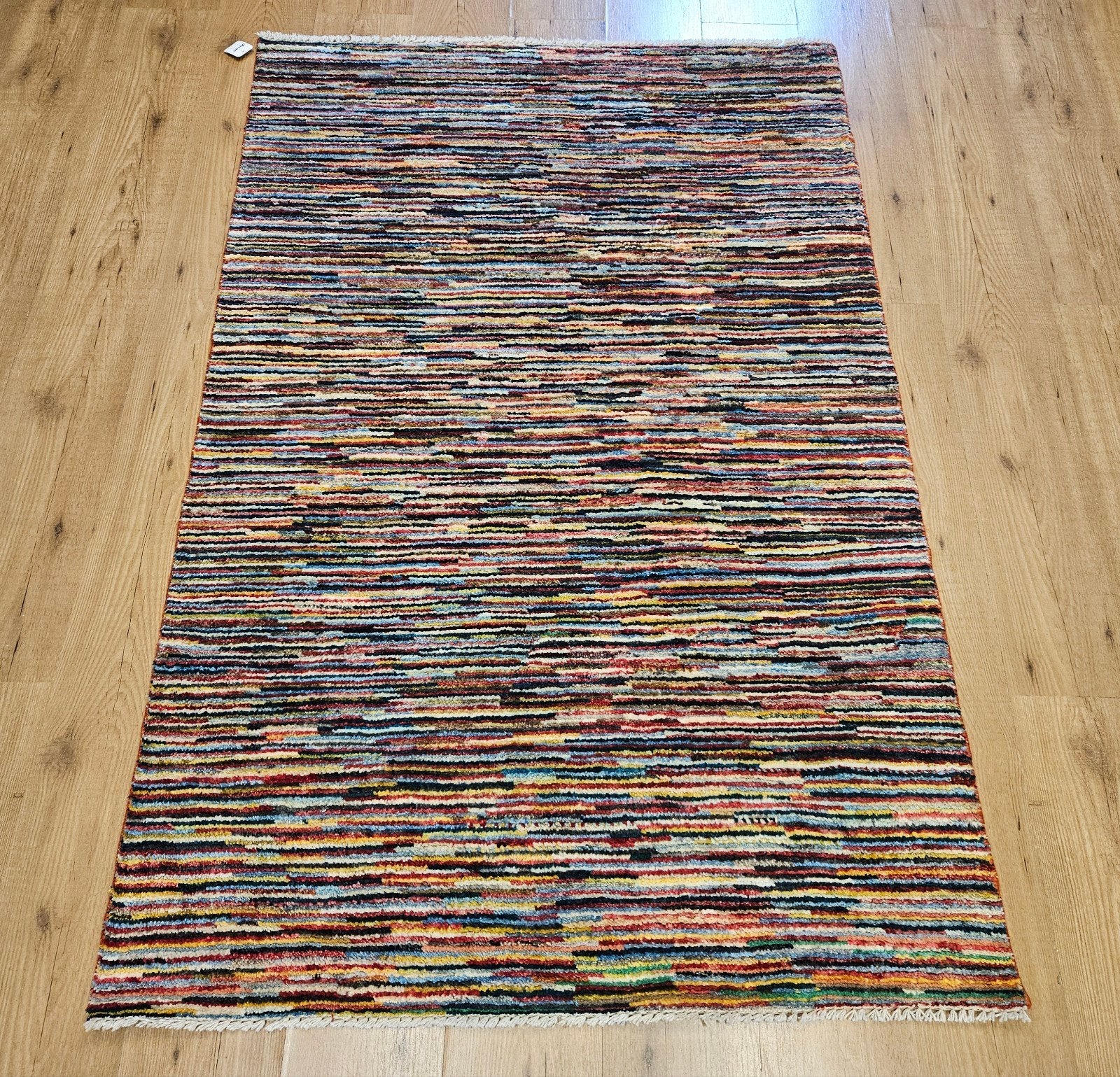 Handgeknoopt oosters tapijt modern design 170x115