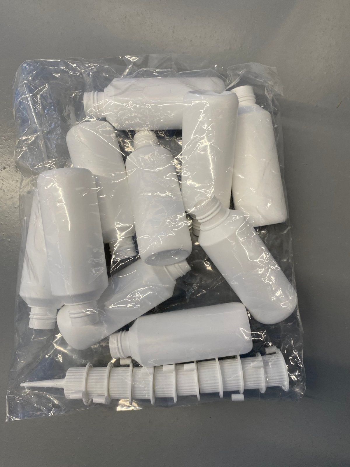 Lege plastic flesjes, Ophalen