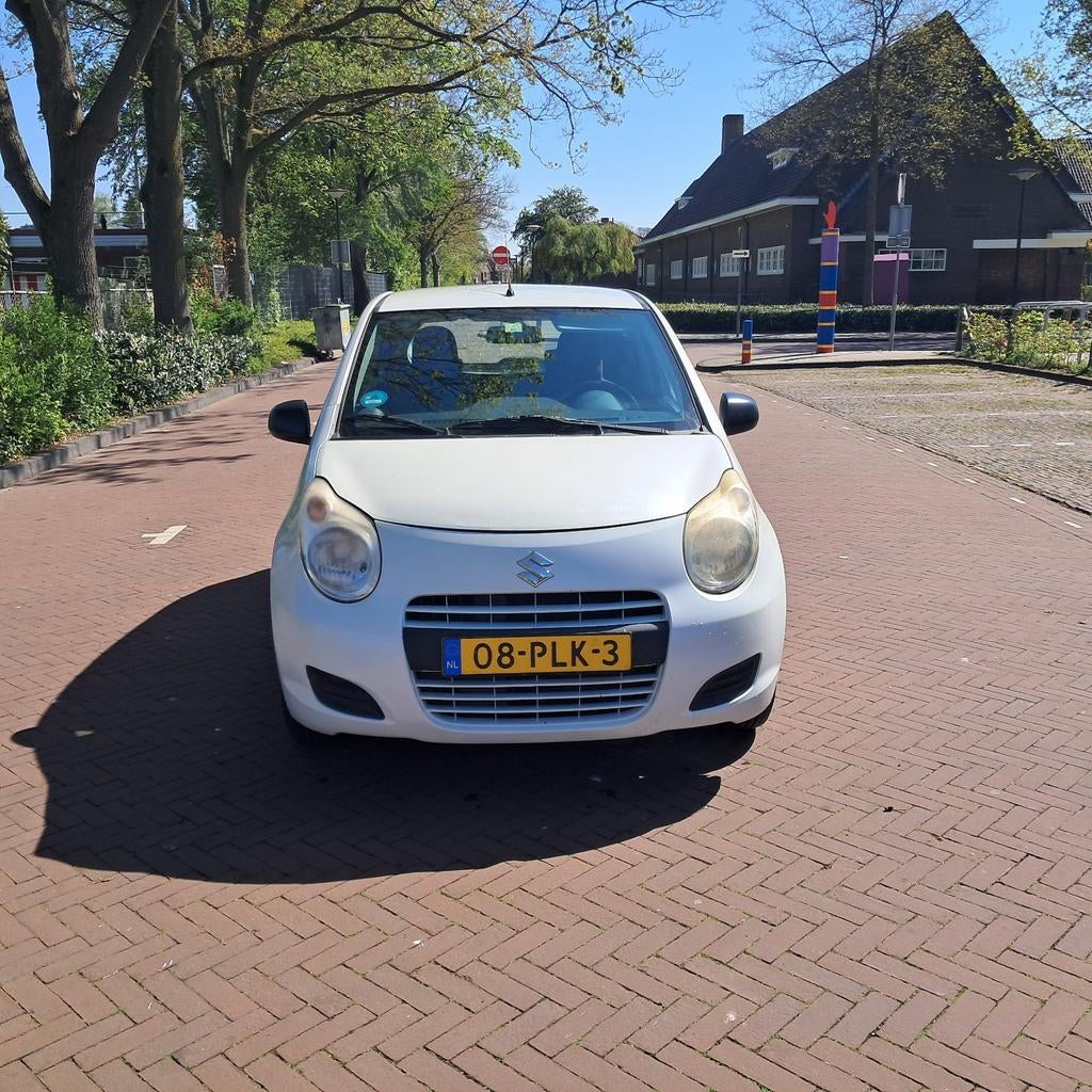 Suzuki Alto 1.0 2011 Wit, Auto's, Voorwielaandrijving, 200 kg, 4 stoelen, Origineel Nederlands