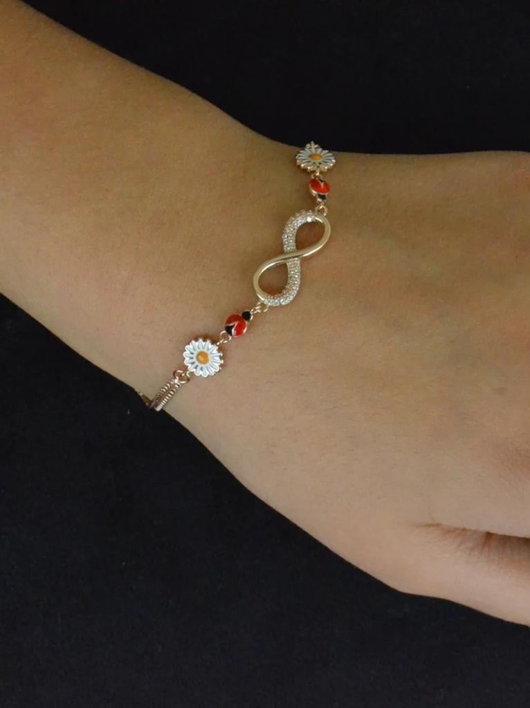 Zilveren armband met oneindigheidsteken, madeliefjes, Overige materialen, Nieuw, Ophalen of Verzenden, Goud