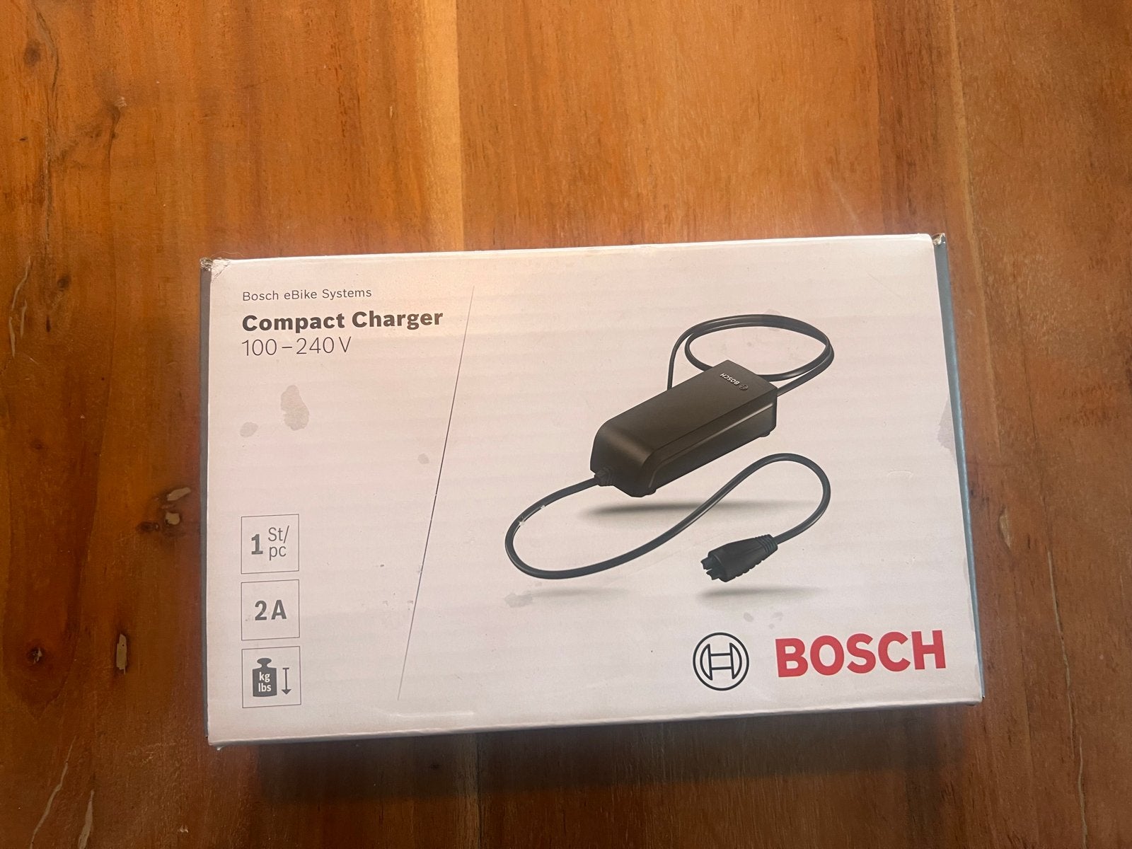 Bosch Compact Charger 2A voor eBike - Nieuw in doos, Fietsen en Brommers, Fietsaccessoires | Fietsaccu's, Ophalen of Verzenden