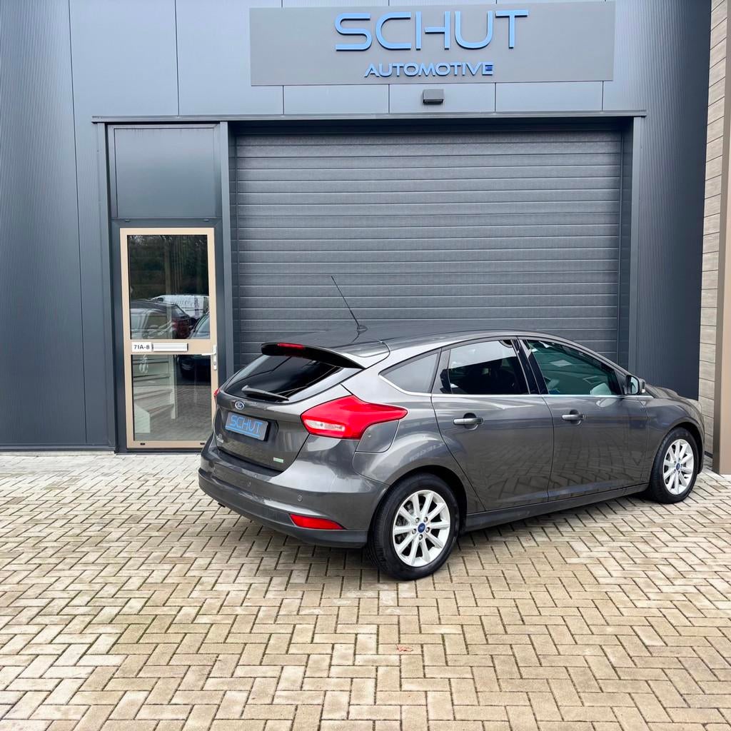 Ford Focus 125pk Titanium CLIMA | NAVI |CRUISE CONTROL | STO, Auto's, Ford, Zwart, Bedrijf, Handgeschakeld, Zilver of Grijs