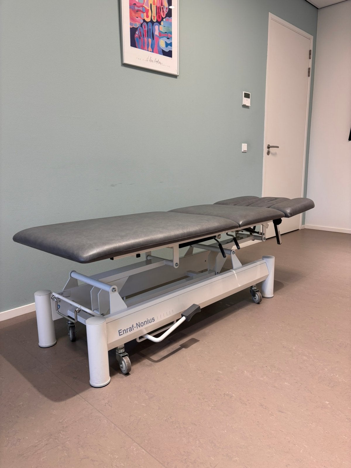 Enraf Nonius hydraulische behandelbank, Ophalen, Zo goed als nieuw, Massagetafel