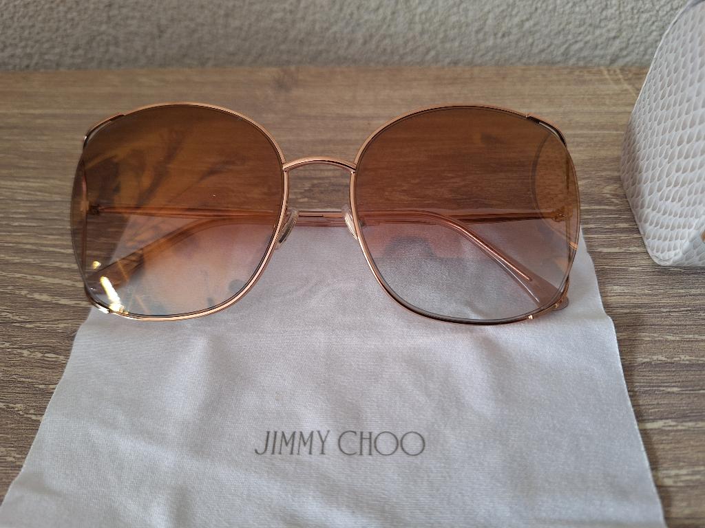 Jimmy Choo zonnebril., Sieraden, Tassen en Uiterlijk, Zonnebrillen en Brillen | Dames, Ophalen of Verzenden, Gebruikt, Zonnebril
