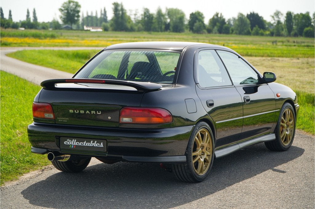 Subaru Impreza 2.0 GT AWD Turbo 555 Limited (bj 1998), Elektrische ramen, Zwart, Origineel Nederlands, Bedrijf