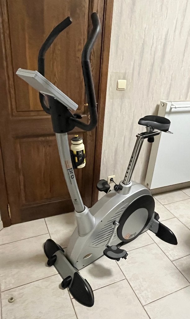 Hometrainer E9 pro Xelus studio-ergometer, Ophalen, Gebruikt, Metaal, Benen