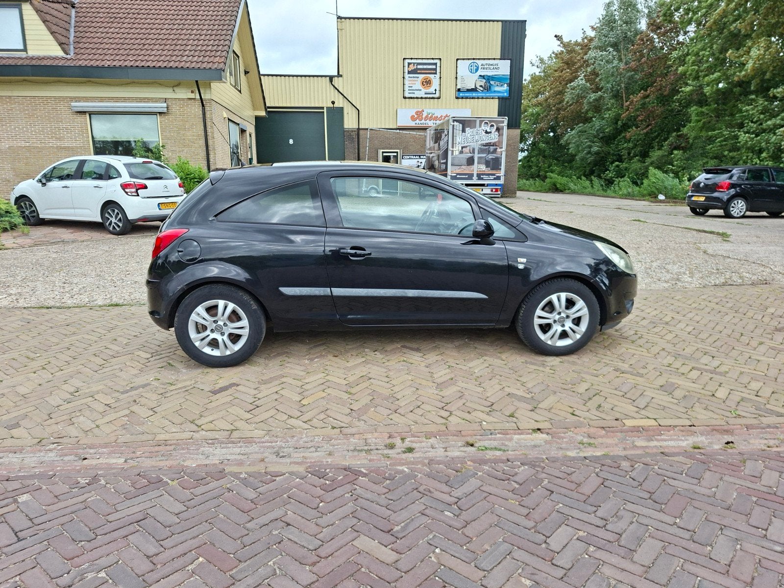 Opel Corsa 1.4 16V 3D 2011 Zwart, Auto's, Voorwielaandrijving, 40 €/maand, 1398 cc, 4 cilinders