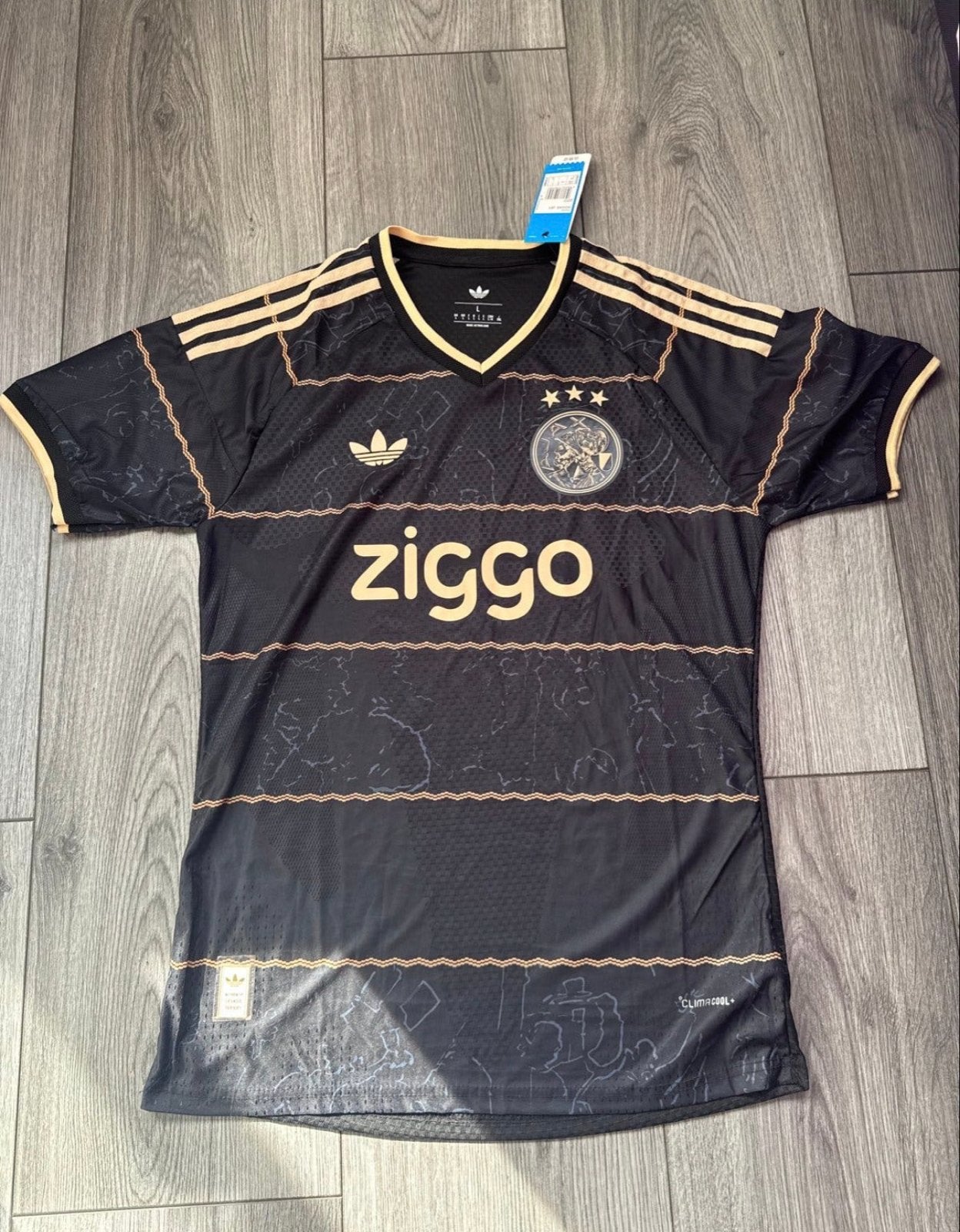 Ajax uitshirt - Zwart/Goud - Maat L, Maat L, Ophalen of Verzenden, Nieuw, Shirt