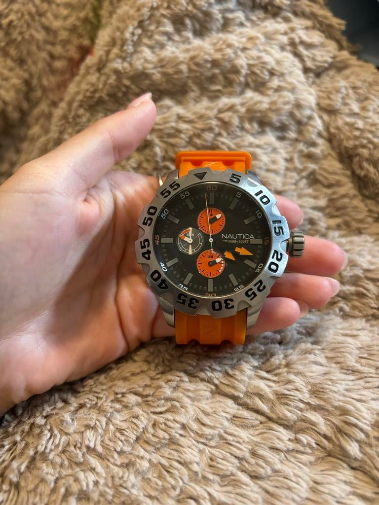 Nautica horloge met opvallende oranje band (batterij leeg), Ophalen of Verzenden, Gebruikt, Staal