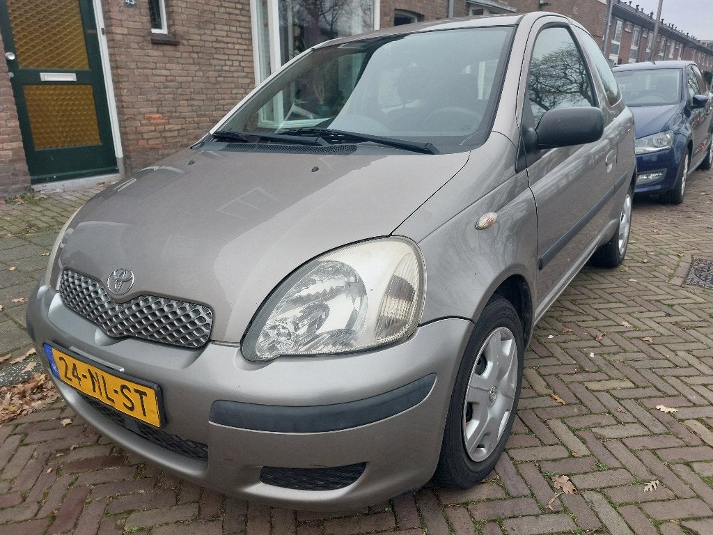 Toyota Yaris 1.3 16V Vvti 3DR Linea Terra 2004 Grijs, Auto's, Toyota, Voorwielaandrijving, Stof, 4 cilinders, 400 kg