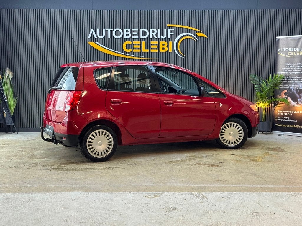 Mitsubishi Colt 1.1 Edition One 2010 ROOD APK|NAP|AIRCO, Auto's, Mitsubishi, Euro 5, Stof, Gebruikt, Metallic lak