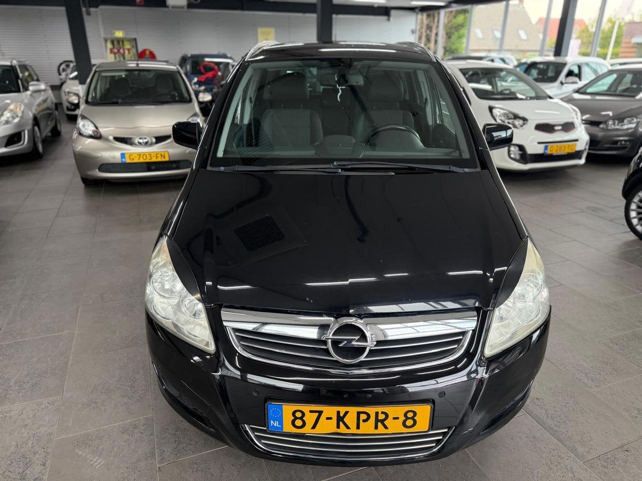 Opel Zafira 1.8 Cosmo automaat 7-prs half leer navigatie cli, Auto's, Gebruikt, Zwart, 4 cilinders, Zwart
