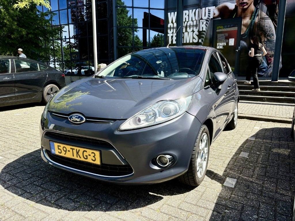 Ford Fiesta 1.25 Titanium 2012 5-drs - APK mei 2027 - NAP, Auto's, Voorwielaandrijving, Euro 5, Stof, 1242 cc