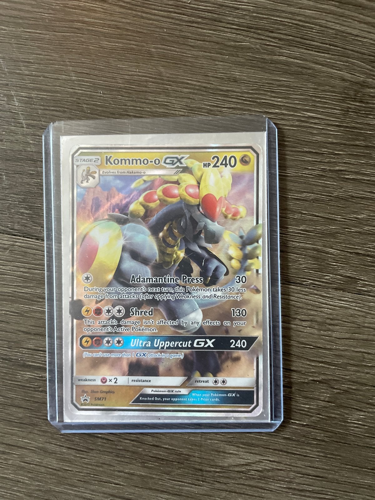 Kommo-o GX Pokémon kaart - Zo goed als nieuw, Hobby en Vrije tijd, Ophalen of Verzenden, Zo goed als nieuw, Losse kaart