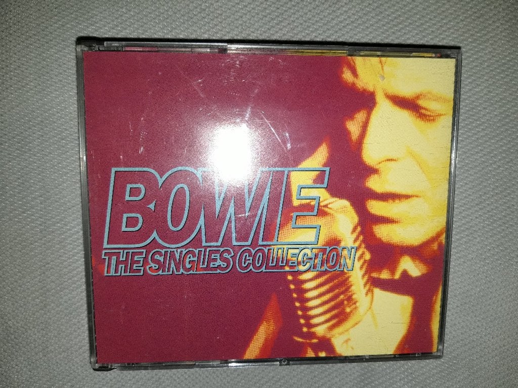 David Bowie, The singles collection, Pop, Ophalen of Verzenden, Zo goed als nieuw, Inclusief boekje