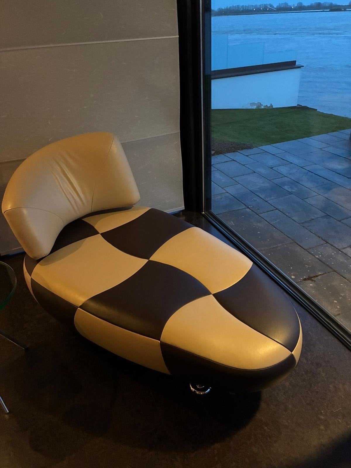 Leolux Kikko lounge fauteuil - Tweekleurig leer, Ophalen, 100 tot 125 cm, Leer, Zo goed als nieuw