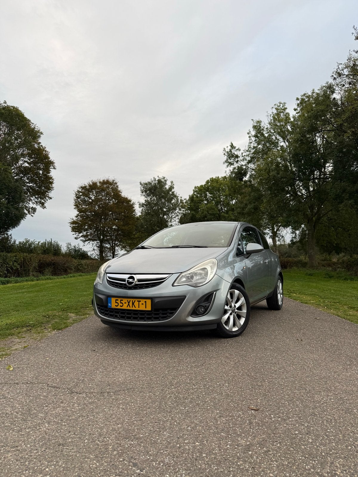 Opel Corsa 1.2 16V LPG 3D 2012 Grijs, Auto's, Voorwielaandrijving, 83 pk, 4 cilinders, 1229 cc