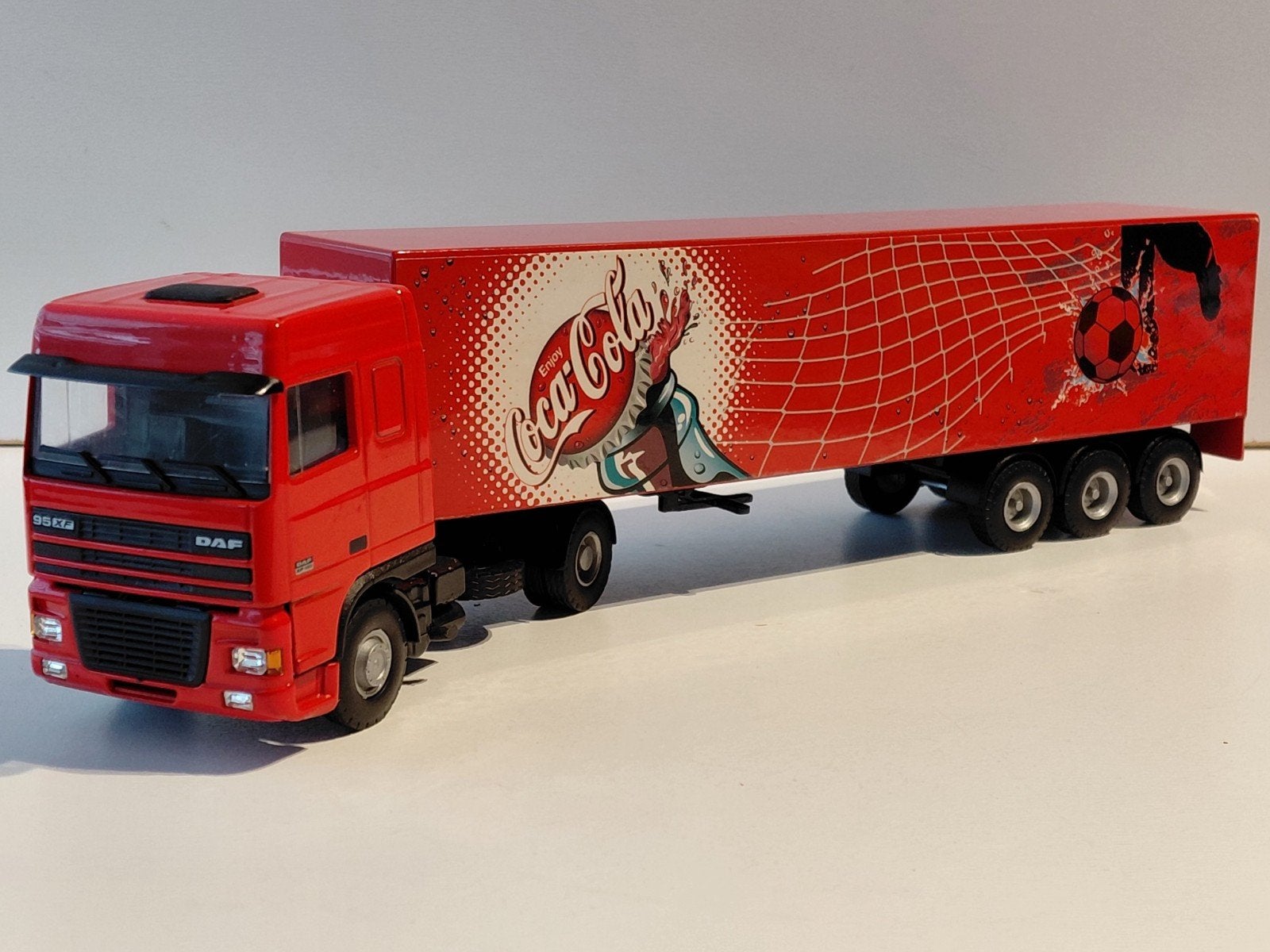 Lion Car DAF 95XF oplegger CocaCola vrachtauto modelauto, Ophalen of Verzenden, Zo goed als nieuw, Bus of Vrachtwagen, Lion Toys