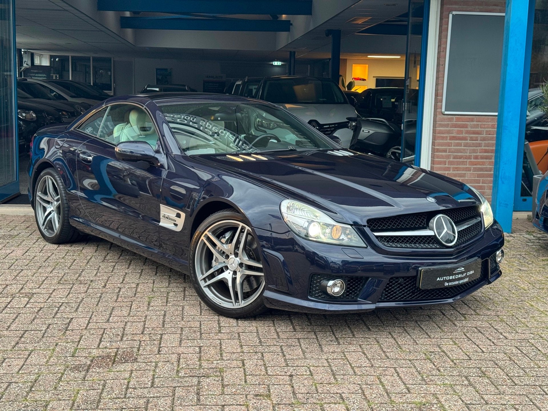 Mercedes-Benz SL-klasse AMG 63 2009 CABRIO FULL NAP NL Auto!, Automaat, Dealer onderhouden, Achterwielaandrijving, Gebruikt