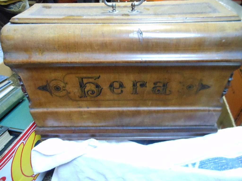 oude hand naaimachine, Ophalen