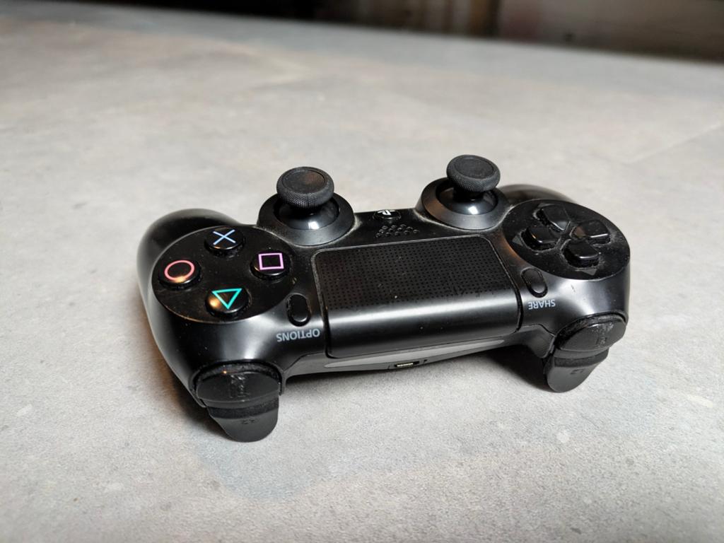 PS4 controller (zwart), Ophalen of Verzenden, Zo goed als nieuw