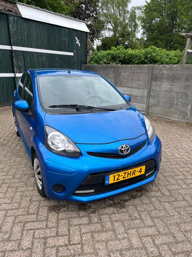 Toyota Aygo 1.0 12V Vvt-i 5DRS 2012 Blauw, Voorwielaandrijving, Stof, Zwart, Origineel Nederlands