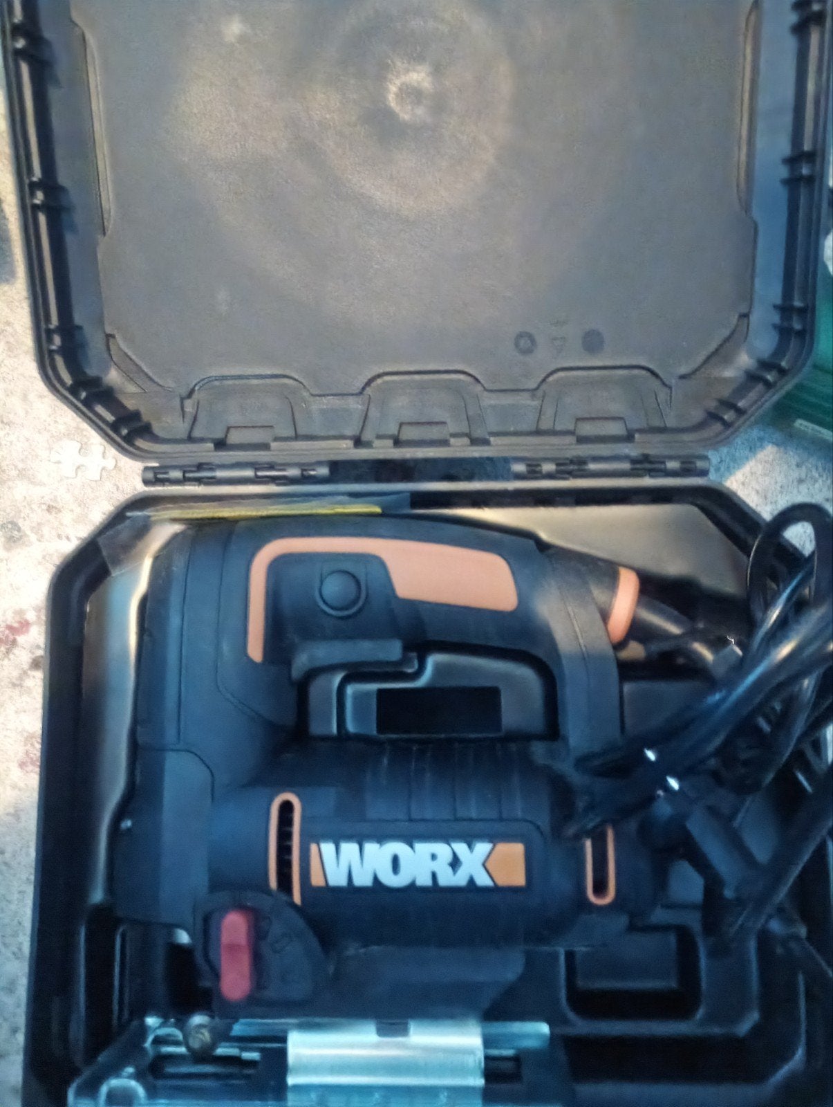 Worx Decoupeerzaag in koffer, Ophalen