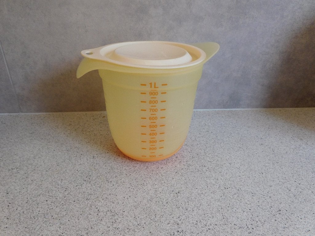Tupperware Combiplus Maatkan 1 Ltr.  Oranje Geel, Huis en Inrichting, Keuken | Tupperware, Ophalen of Verzenden, Zo goed als nieuw